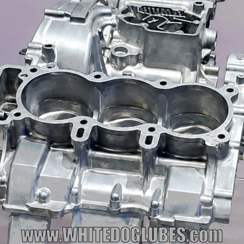 Close up of a crankcase just out of the mold showing the rough edges