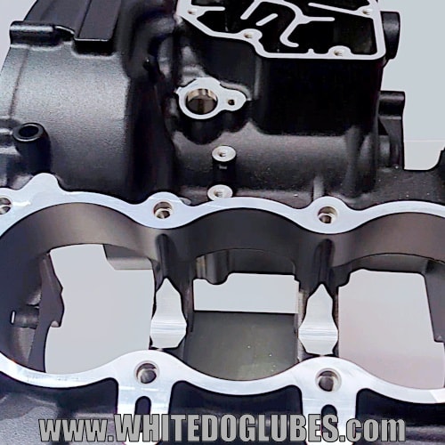 Close up of the machined crankcase showing the clean mating surfaces, oil channekls and bolt holes