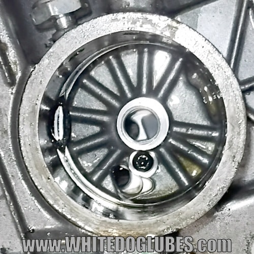 The incorrectly seated rubber oil seal showing part intruding into the filter cavity