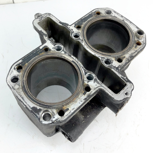 What does the motorcycle cylinder barrel do?